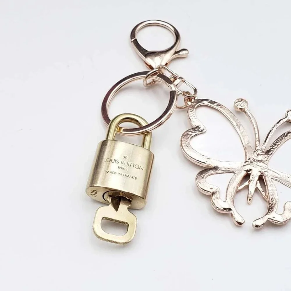 Authentic Louis Vuitton Lock & Key with unbranded Butterfly Bagcharm, Keycharm